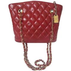 Vintage CHANEL lipstick red lamb leather trapezoid shape tote bag with cc motif.