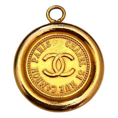 Vintage CHANEL Gold Toned Cambon Coin Pendant Charm