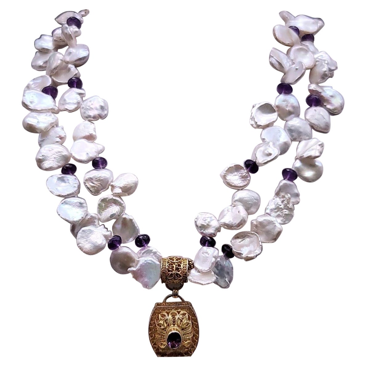 A.Jeschel Double strand Keshi Pearl with an Amethyst vermeil pendant. For Sale