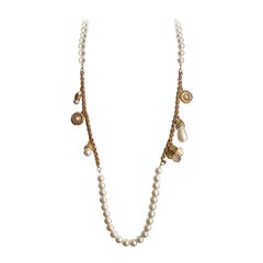 GIVENCHY faux pearl necklace with gilt charms