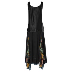 Asymmetrical black satin and printed and flowers embroidered crêpe Circa 1920