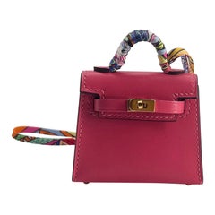 Hermès Kelly Twilly Bag Charm  Rose rouge à lèvres, GHW