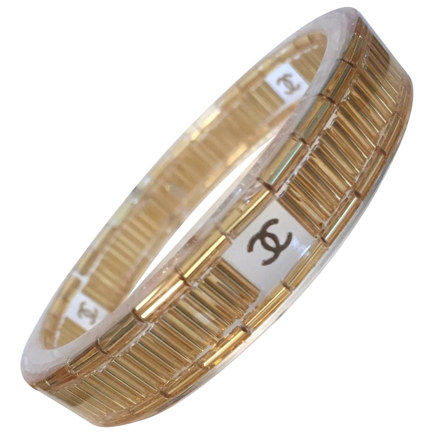 Chanel Gold Resin Logo Bangle Bracelet at 1stdibs