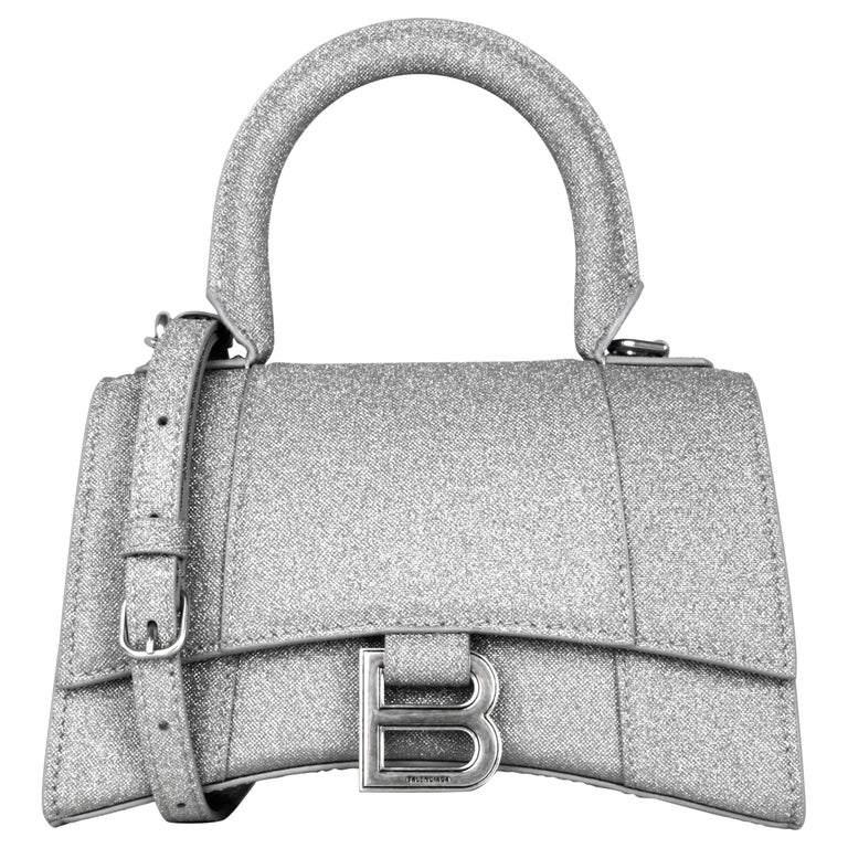 Balenciaga Silver Glitter Hourglass XS Top Handle Crossbody Bag at 1stDibs  | balenciaga silver glitter bag, balenciaga silver bag