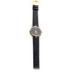Vintage Gucci Women's Black and Gold Tone Reptile Band Watch