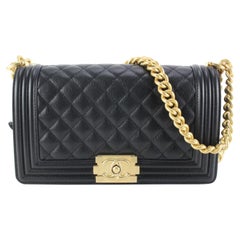 Chanel Schwarze gesteppte Kaviar-Ledertasche Medium Boy mit Goldkette 84ck85s