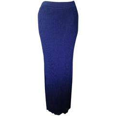 Vintage CHANEL navy knit long skirt with golden CC button. Classic look.