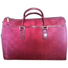 Vintage Givenchy travel duffle bag in logo jacquard wine color fabric. Unisex