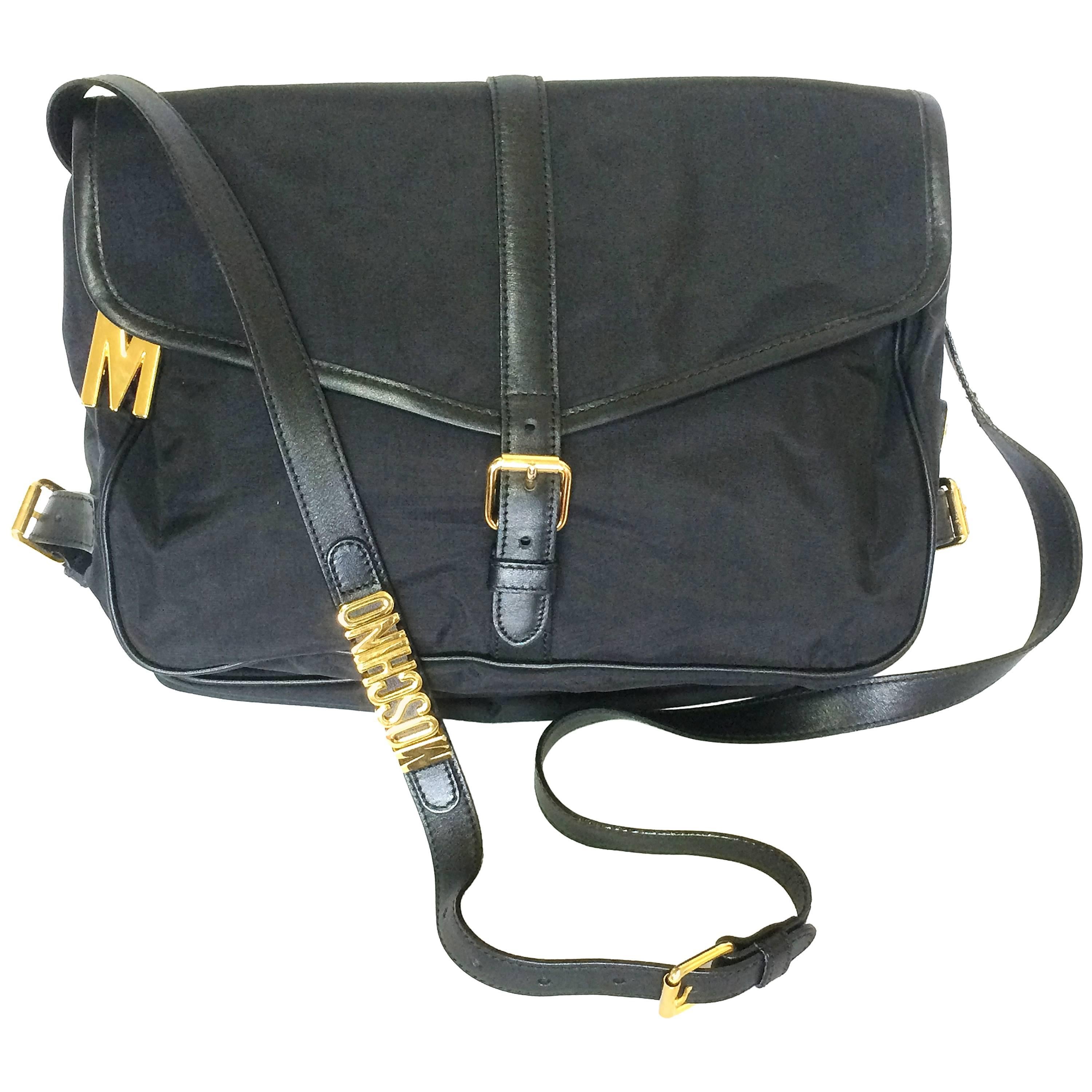 MINT. Vintage Moschino black nylon saumur messenger shoulder bag with leather For Sale