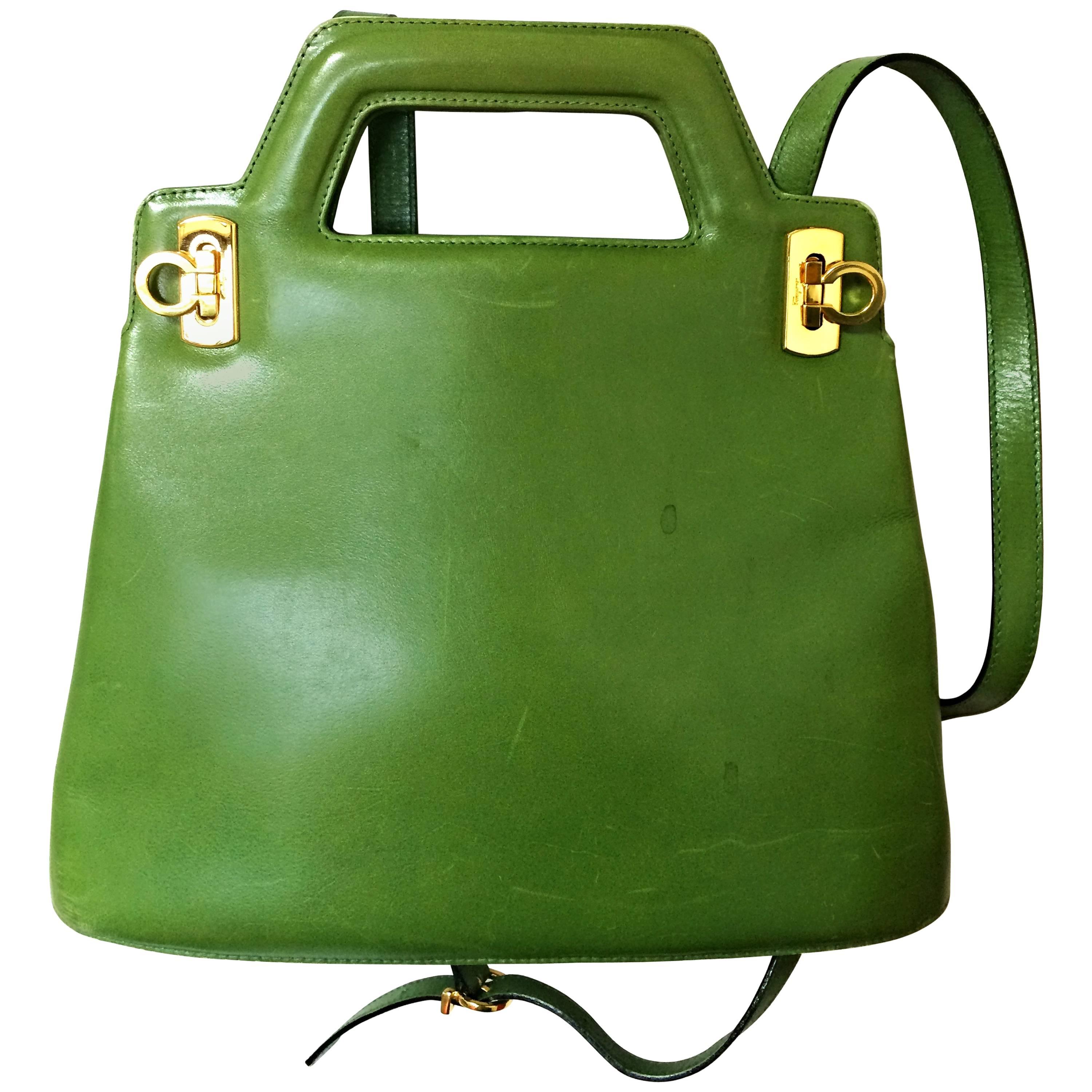 Vintage Salvatore Ferragamo green leather golden gancini trapezoid shape handbag For Sale