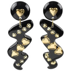 Oversized Dangle Black Lucite Clip Earrings with Gilded Heart Inclusions
