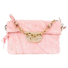 2000s Nina Ricci pink leather laced small bag
