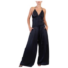 Morphew COLLECTION - Pantaloni oversize con pieghe a scatola in seta Charmeuse neri