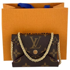 Louis Vuitton - Sac à bandoulière KIRIGAMI POCHETTE avec bandoulière avec monogramme et sangle, petit modèle