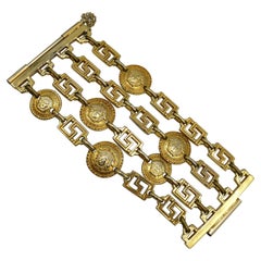 GIANNI VERSACE Vintage Iconic Gold Toned Four-Strand Medusa Cuff Bracelet