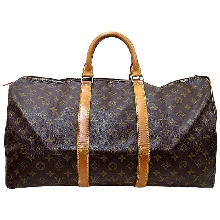 Vintage Louis Vuitton monogram travel keepall 50 duffle bag. Bandouliere purse. 