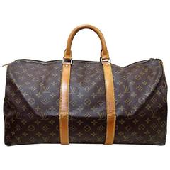 Vintage Louis Vuitton monogram travel keepall 50 duffle bag. Bandouliere purse.