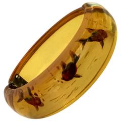 INCREDIBLY RARE 1930s Apple Juice Reverse Carved  FISH Hinged Bracelet 