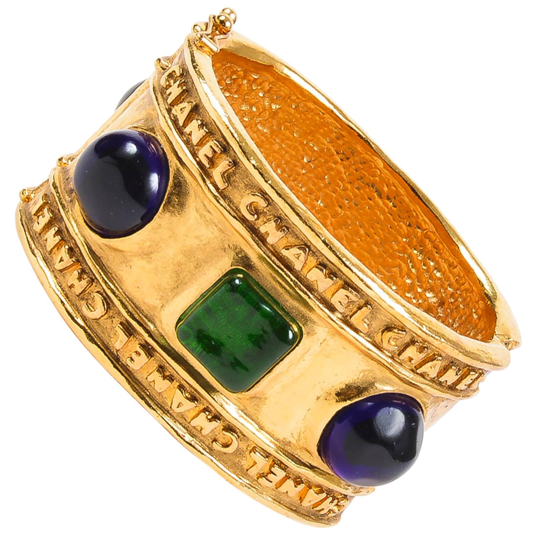 Vintage Chanel Gold Tone Hammered Blue Green Stone Embellished Cuff Bracelet For Sale