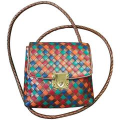 Vintage Bottega Veneta intrecciato shoulder bag in bronze, red, orange, & green.