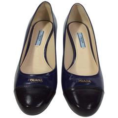 Prada Navy and Black Rounded Toe Heels with Gold Hardware