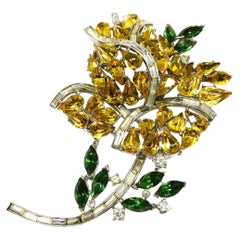 A large citrine, emerald and clear paste 'rose' brooch, Trifari, USA, 1950s