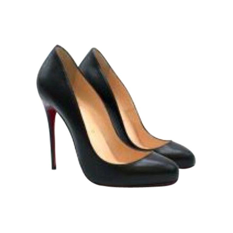 Black leather heeled pumps For Sale