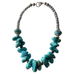 Lorraine’s Bijoux offers chunky turquoise necklace. Handmade One of a kind piece