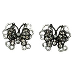 Black and White Diamond Butterfly stud Earrings in 18KW Gold