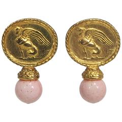 Jaded faux gold winged sphinx & angel skin coral ball clip back earrings 