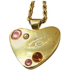 Vintage Christian Lacroix heart chain long necklace with pink and orange stones.