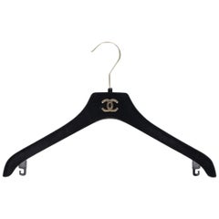 90s Chanel black velvet slim clothes hanger