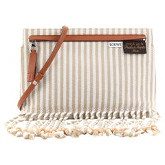 + Paula's Ibiza Pochette leather-trimmed striped raffia shoulder bag