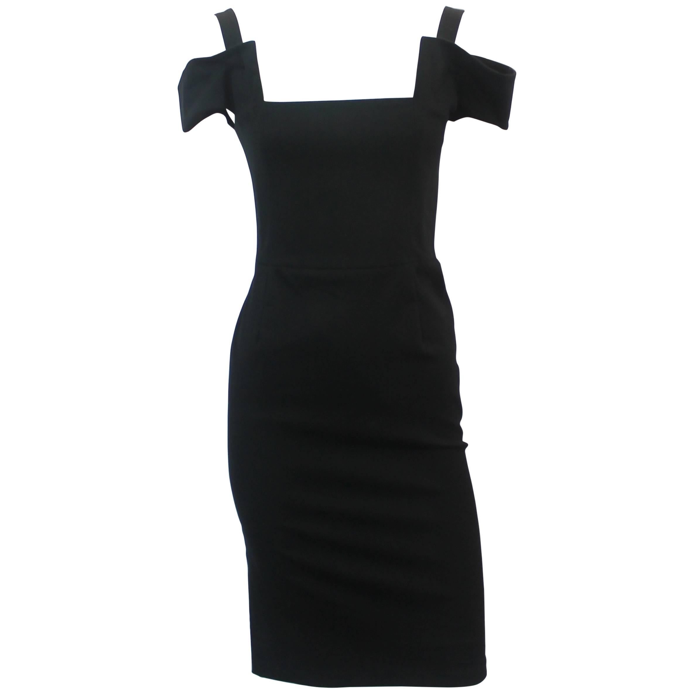 Schwarzes spitz zulaufendes Kleid aus Baumwollmischung von Fendi mit Ausschnitten - 40 im Angebot