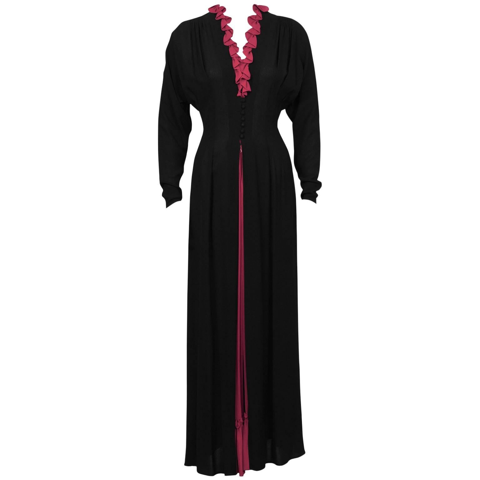 1970's Black Moss Crepe Gown with Fuchsia Ruffle Detail 