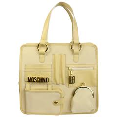 Moschino Cremefarbene Tragetasche aus Nylon/Leder mit Riemen