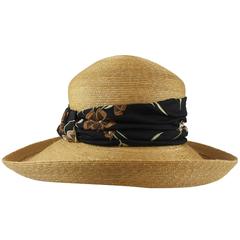 Suzanne Couture Millinery Tan Straw Hat with Black Floral Ribbon 