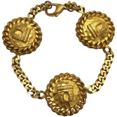 Vintage Celine Gold Tone Paris Arc de Triomphe Medallion Coin Chain Charm Bracelet, 1990