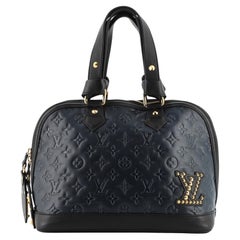 Louis Vuitton Double Jeu Neo Alma Bag Monogram Embossed Leather