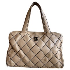 Vintage Chanel bag in powder-colored leather.