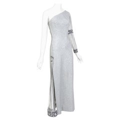 Silver lurex one sleeve vintage 1960s in the style of Pierre Cardin party dress 
