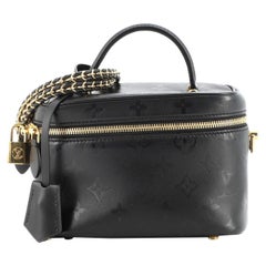 Louis Vuitton Vanity Handbag Monogram Ink Embossed Lambskin PM