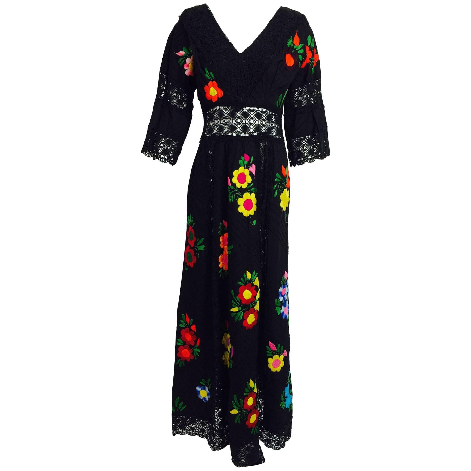 Vintage colourfully embroidered black cotton & lace Mexican maxi dress 1970s