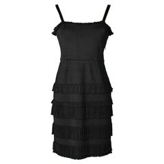 Black cocktail dress in rayon knit and ruffles Christian Dior 