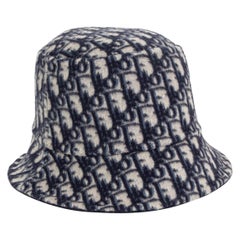 Used CHRISTIAN DIOR navy & ivory wool REVERSIBLE OBLIQUE BUCKET Hat 58