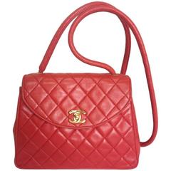 Vintage CHANEL lipstick red lamb leather shoulder bag with leather strap and cc.