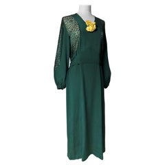 An Emerald green crepe and lace evening dress- France Circa 1940