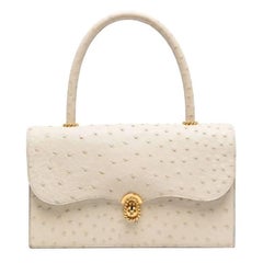 60s Hermès Vintage ivory ostrich leather handbag with gold-tone metal hardware