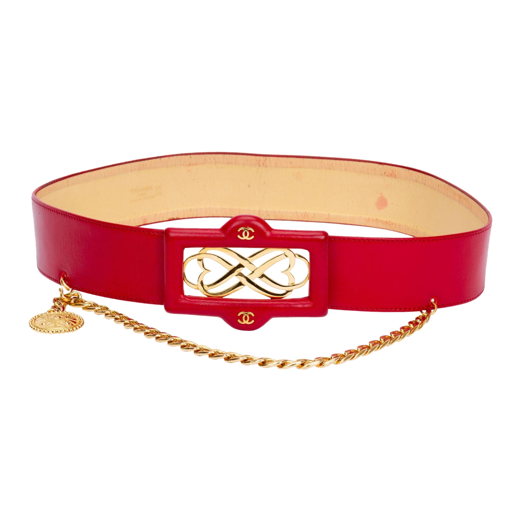 Ceinture rouge Chanel des années 80 avec chute de chaîne