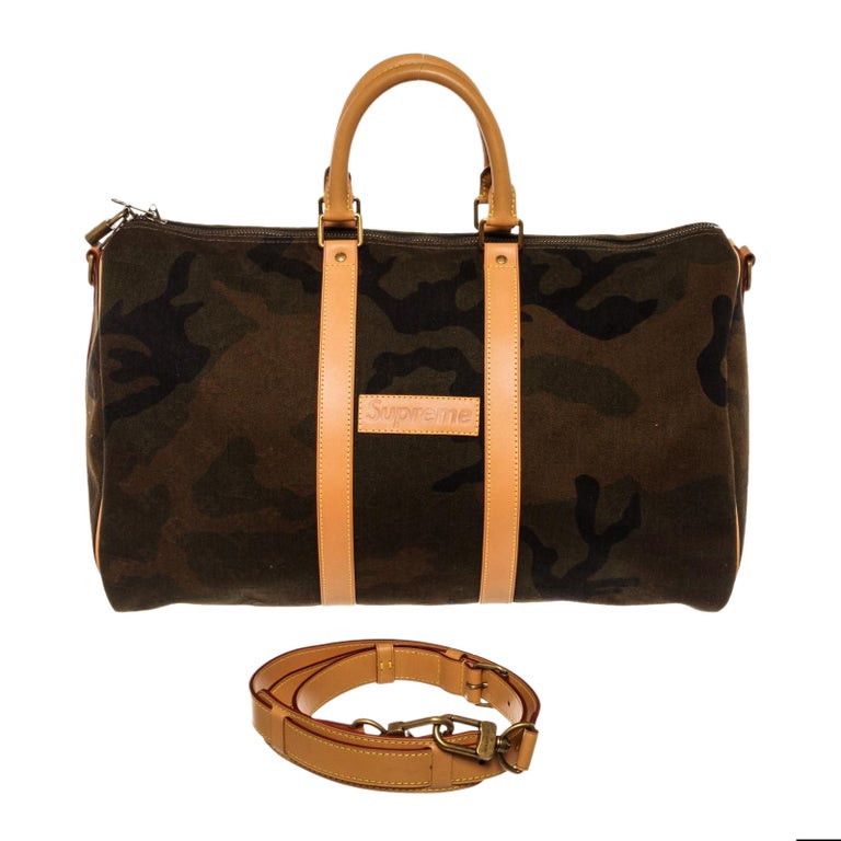 Louis Vuitton x Supreme Green Camo Canvas Keepall Bandouliere 45 cm Duffle Bag at 1stDibs